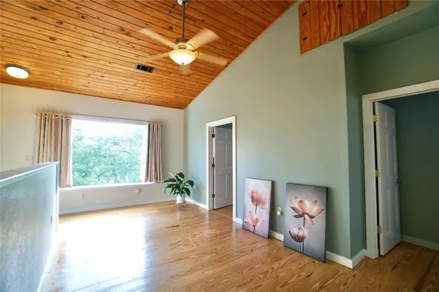 a view of livingroom with hardwood floor and hallway