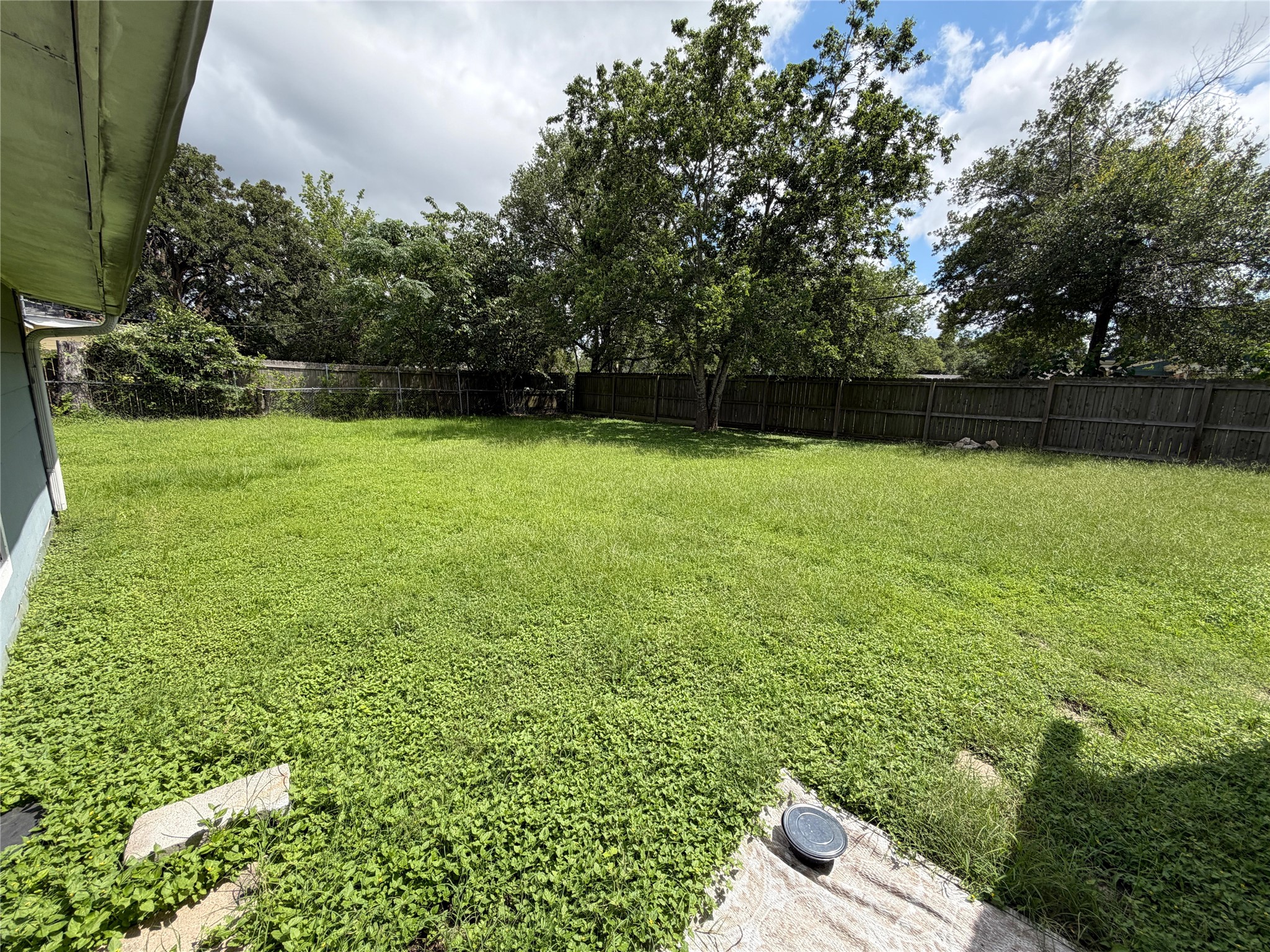 1401 East 29th Street Bryan, TX 77802 - Photo 10 of 13 A spacious, enclosed yard provides ample room for outdoor activities.