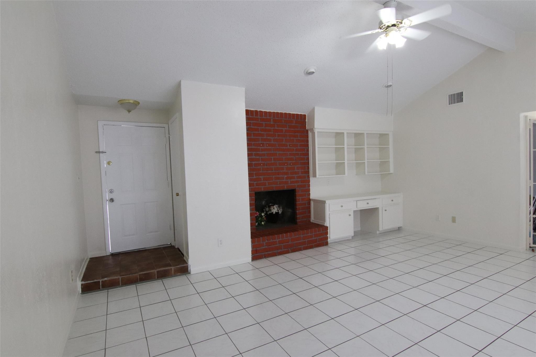 4231 Yupon Ridge Drive Houston, TX 77072 - Photo 2 of 18 a living room with furniture and a fireplace