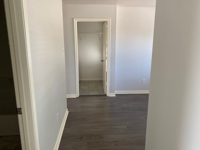 18911 Brownstone Mills Drive Cypress, TX 77433 - Photo 15 of 22 a view of a hallway with wooden floor