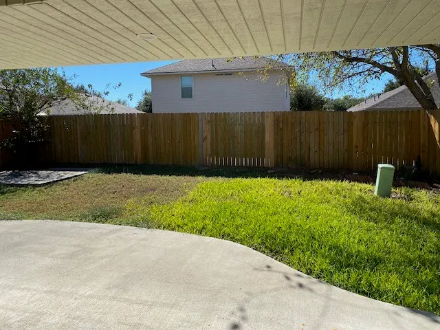 a view of entrance gate of the house