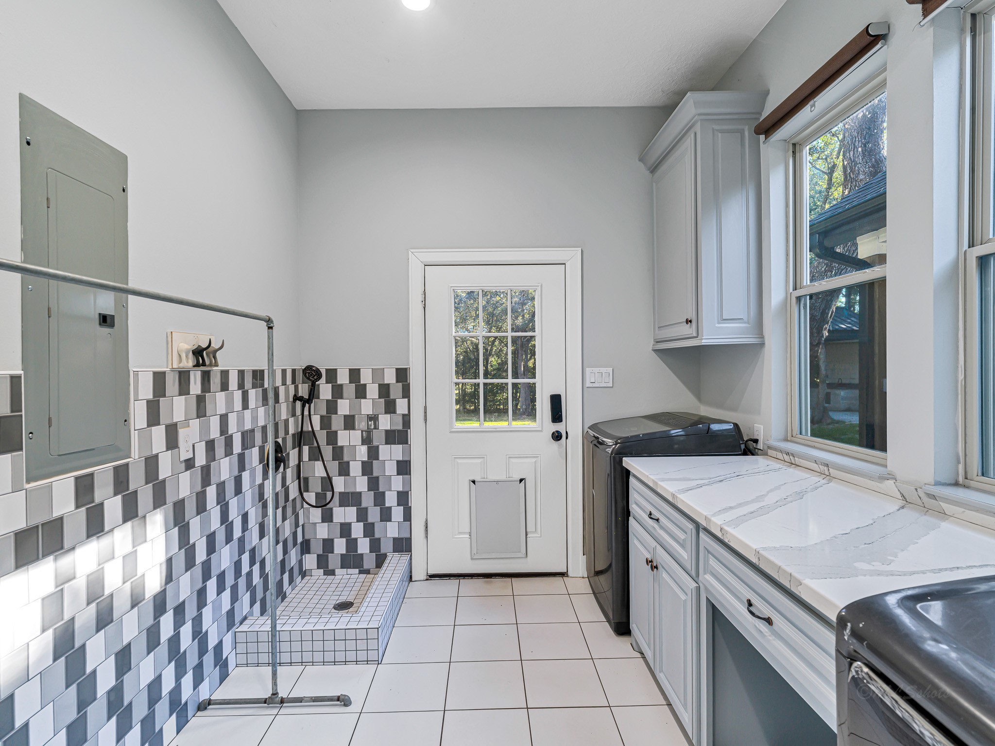 18117 FM 762 Road Needville, TX 77461 - Photo 16 of 37 a kitchen with a stove a sink and a refrigerator