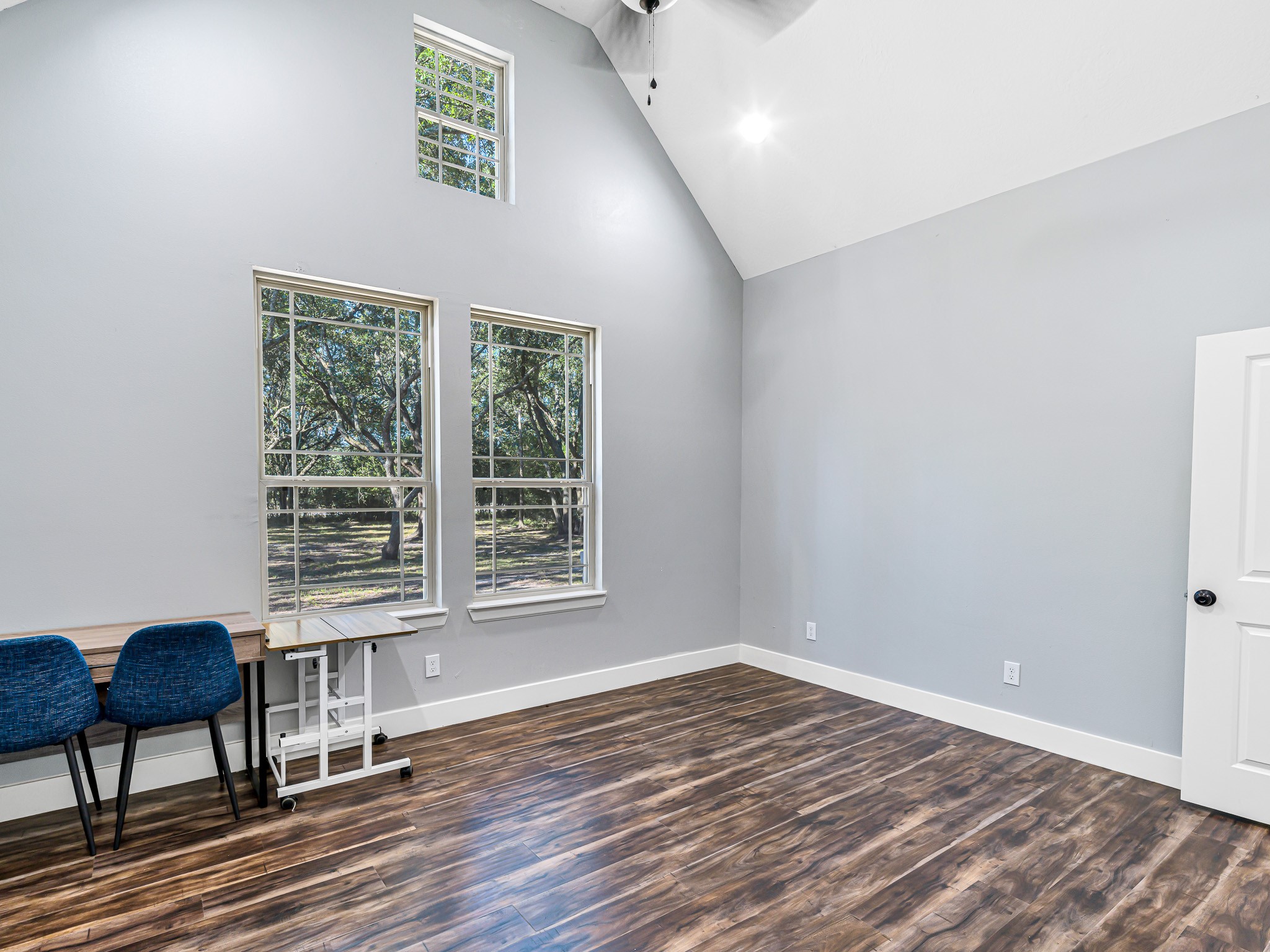 18117 FM 762 Road Needville, TX 77461 - Photo 21 of 37 a view of a livingroom with wooden floor and a window