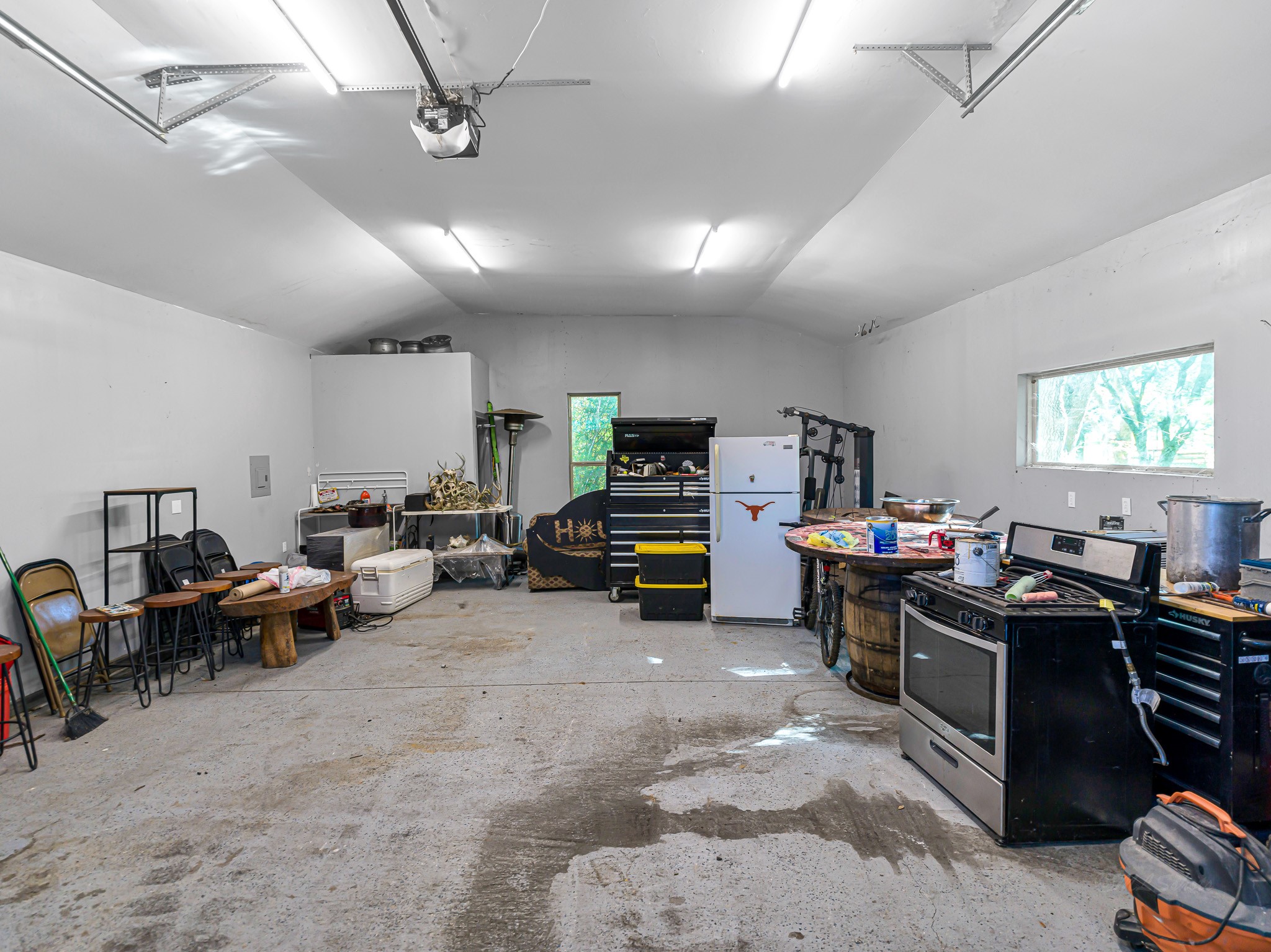 18117 FM 762 Road Needville, TX 77461 - Photo 32 of 37 a living room with lots of furniture and a flat screen tv