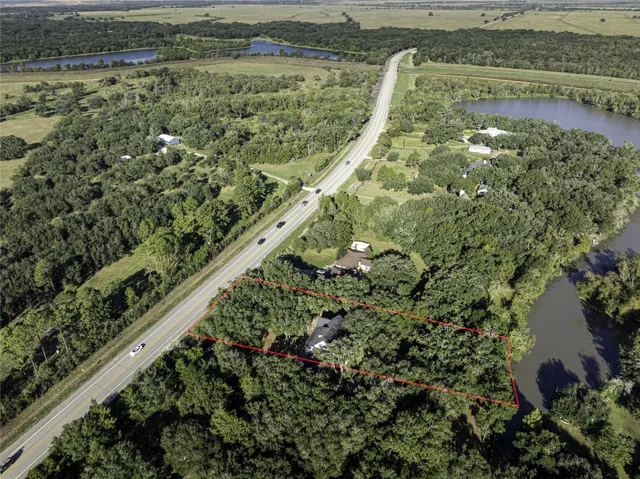 a view of a garden with a lake view