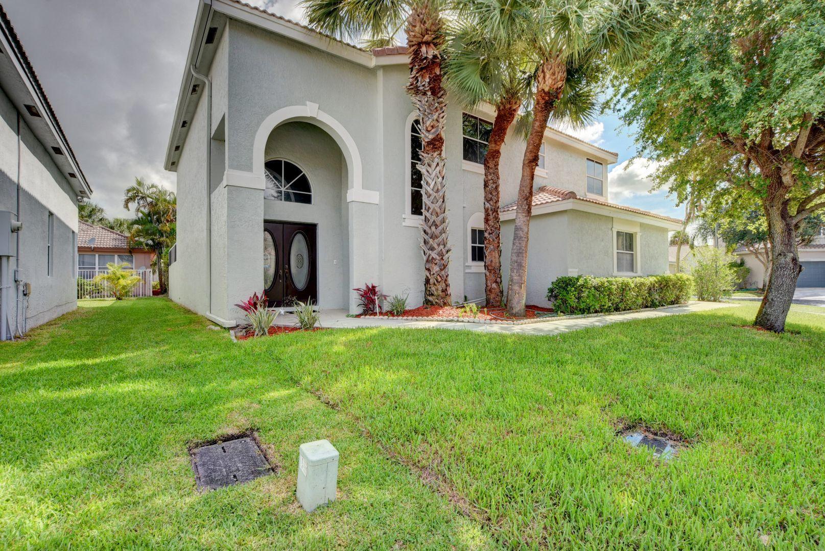 10869 Handel Place Boca Raton, FL 33498 - Photo 1 of 34 Front Corner Lot