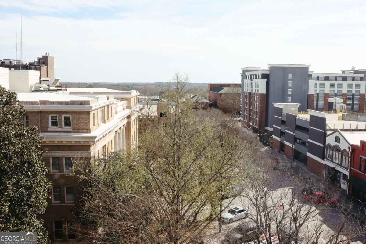 247 West Washington Street, Unit 504 Athens, GA 30601 - Photo 23 of 34 a view of a city with tall buildings