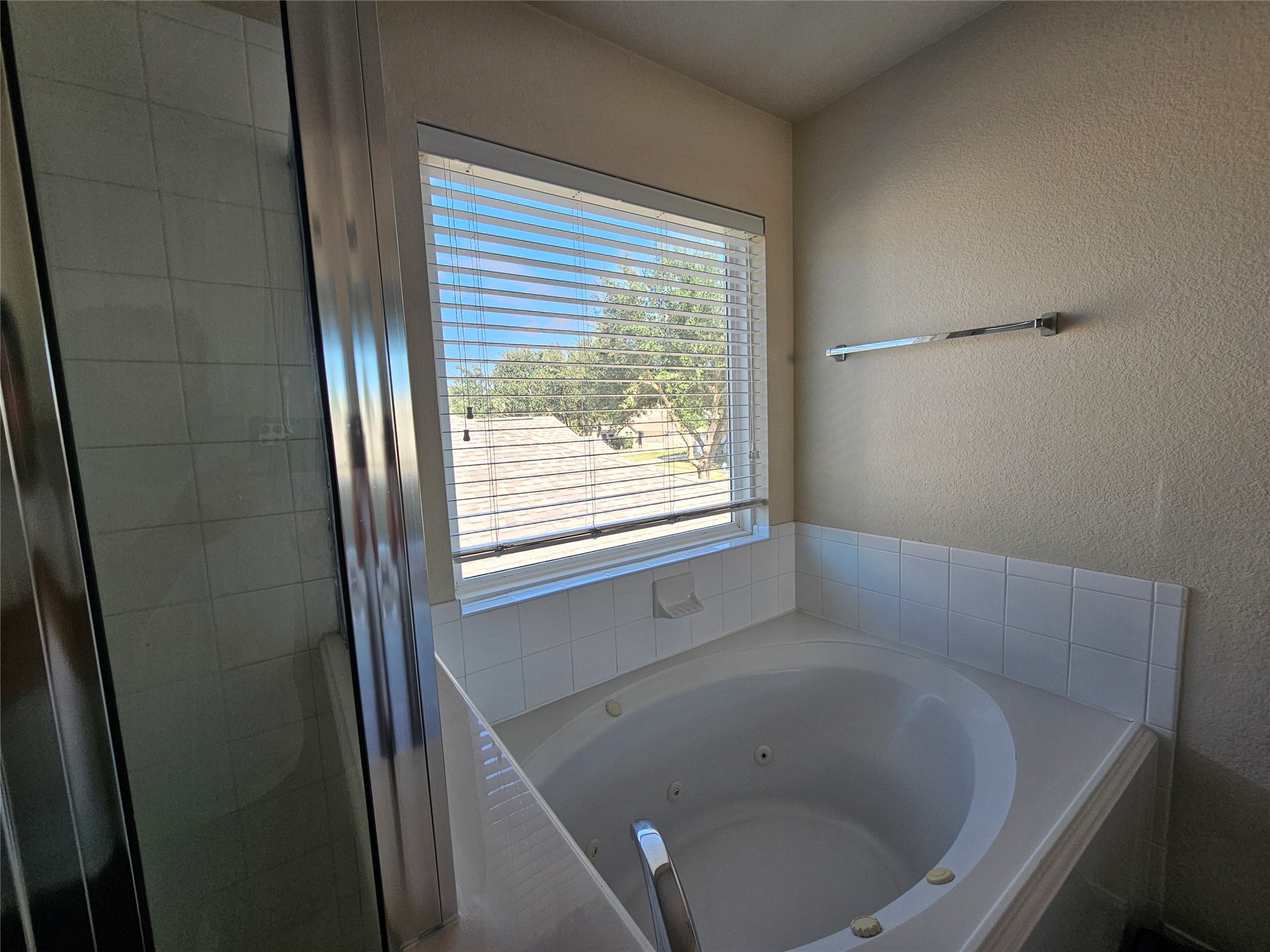 13231 Barrow Point Lane Houston, TX 77014 - Photo 12 of 27 a bathroom with a bathtub