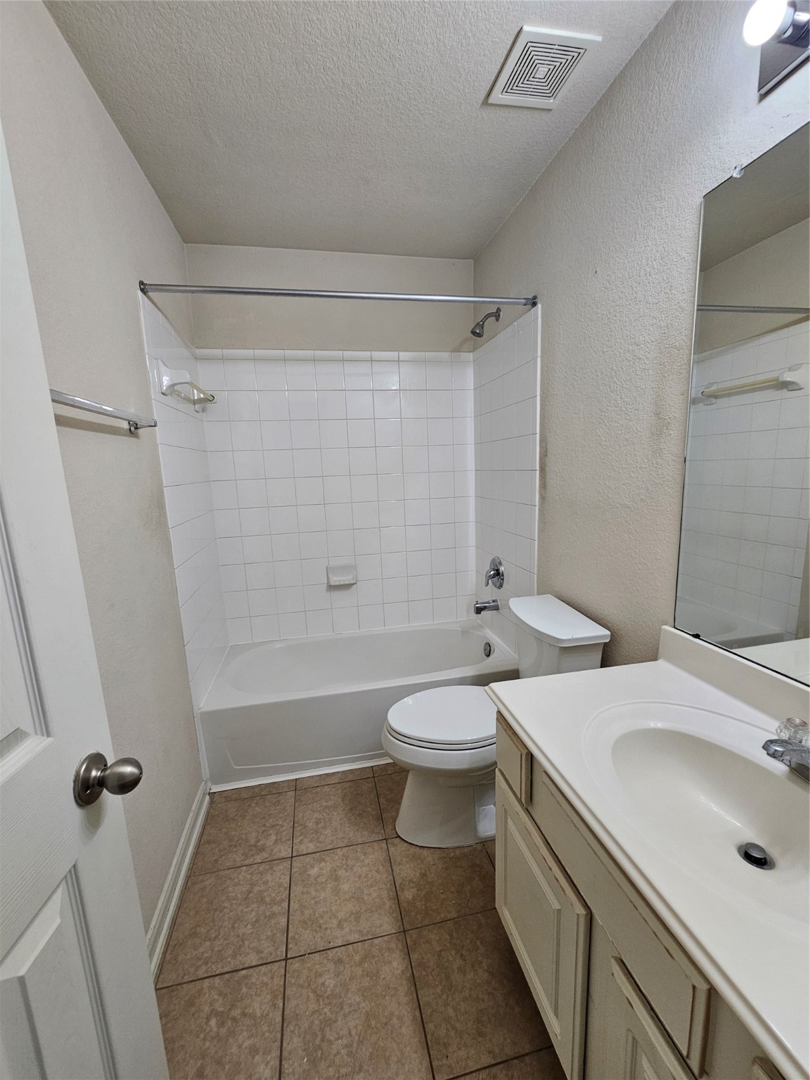 13231 Barrow Point Lane Houston, TX 77014 - Photo 18 of 27 a bathroom with a sink a toilet and shower