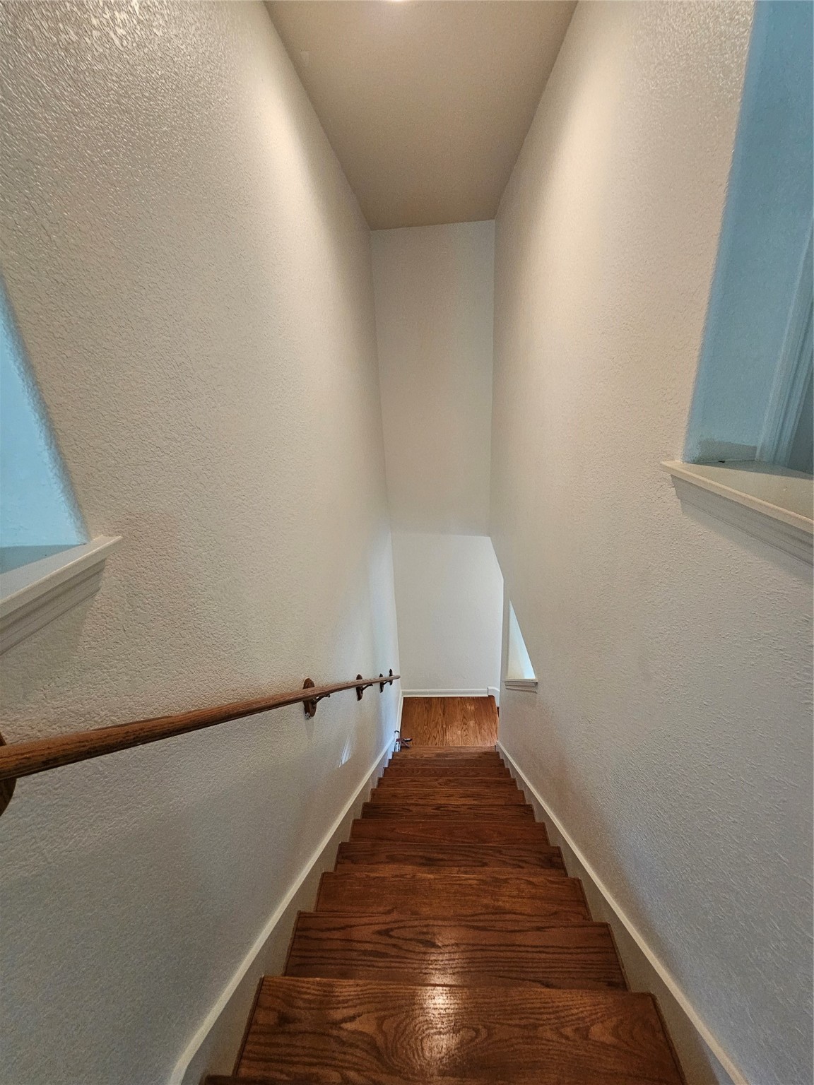13231 Barrow Point Lane Houston, TX 77014 - Photo 24 of 27 a view of a hallway with stairs