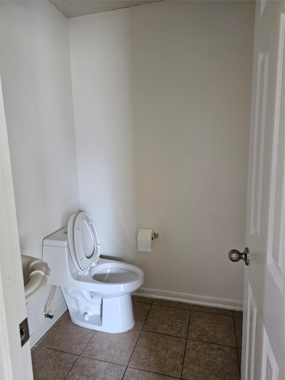 13231 Barrow Point Lane Houston, TX 77014 - Photo 8 of 27 a bathroom with a granite countertop toilet and a sink