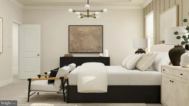 a bedroom with a bed and chair