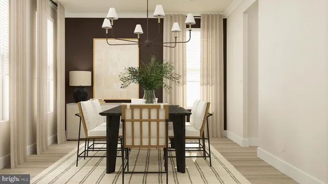 a view of a room with a table and chairs