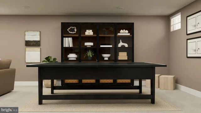 a living room with a table and a window