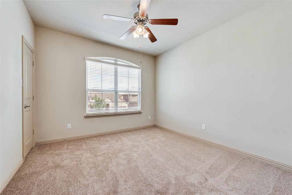 9641 Calaveras Road Fort Worth, TX 76177 - Photo 20 of 23 an empty room with windows and fan