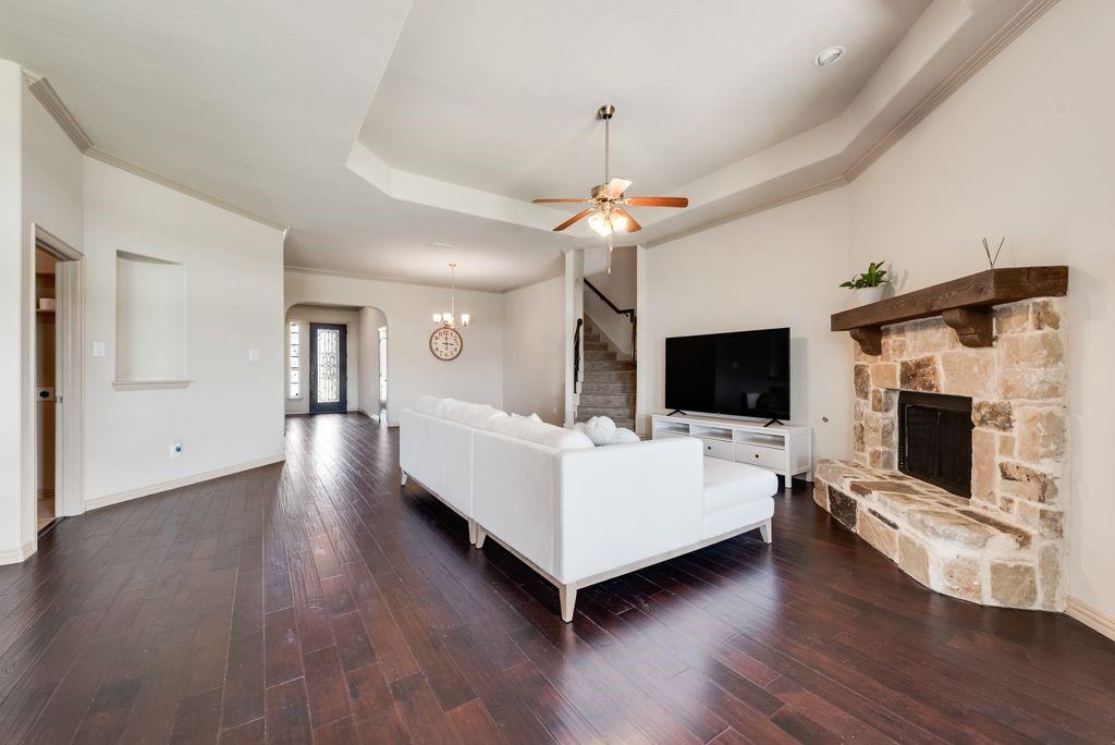 9641 Calaveras Road Fort Worth, TX 76177 - Photo 6 of 23 a living room with furniture fireplace and flat screen tv