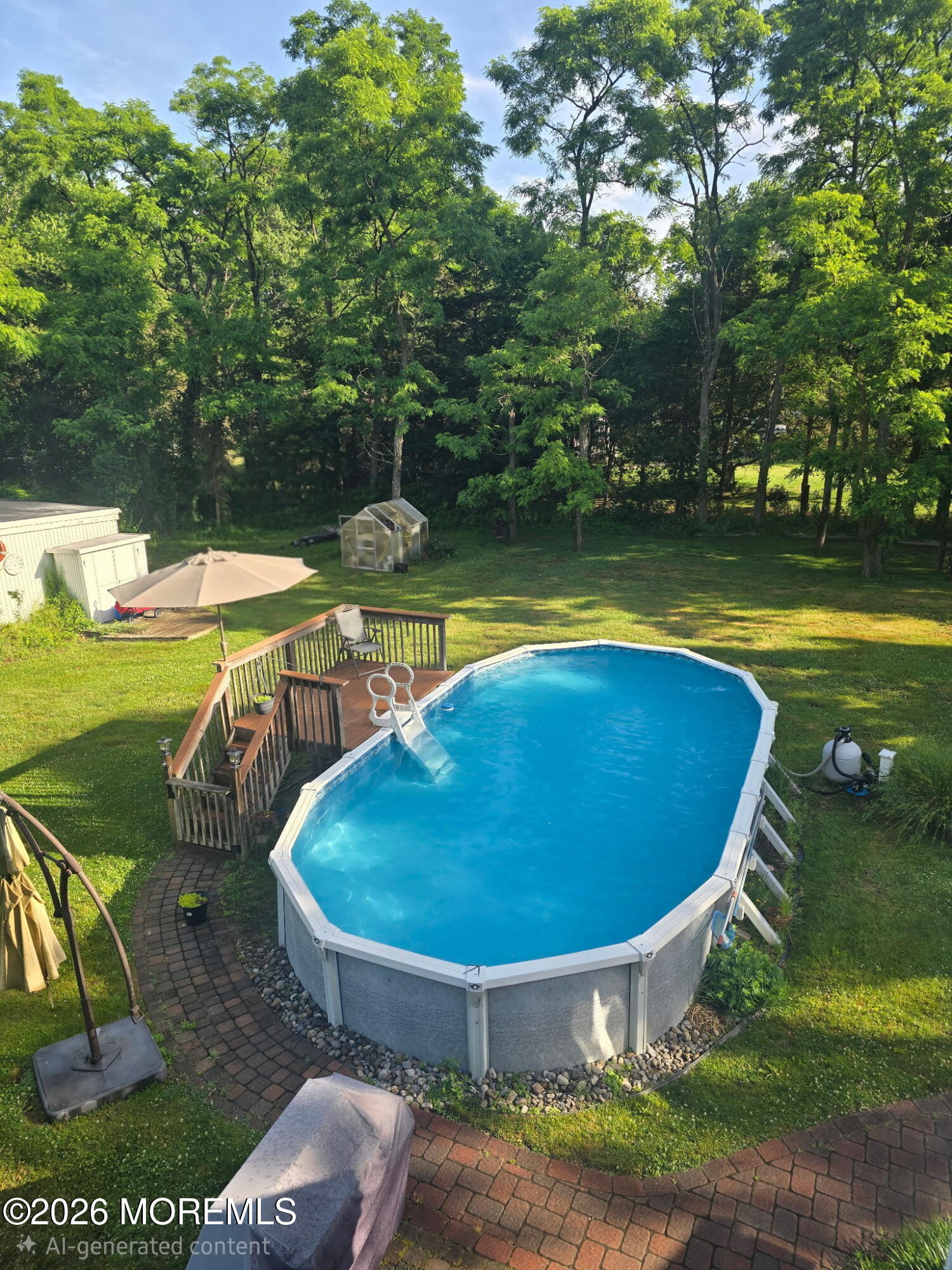 436 Cook Road Jackson, NJ 08527 - Photo 33 of 44 a view of a swimming pool with a yard and plants