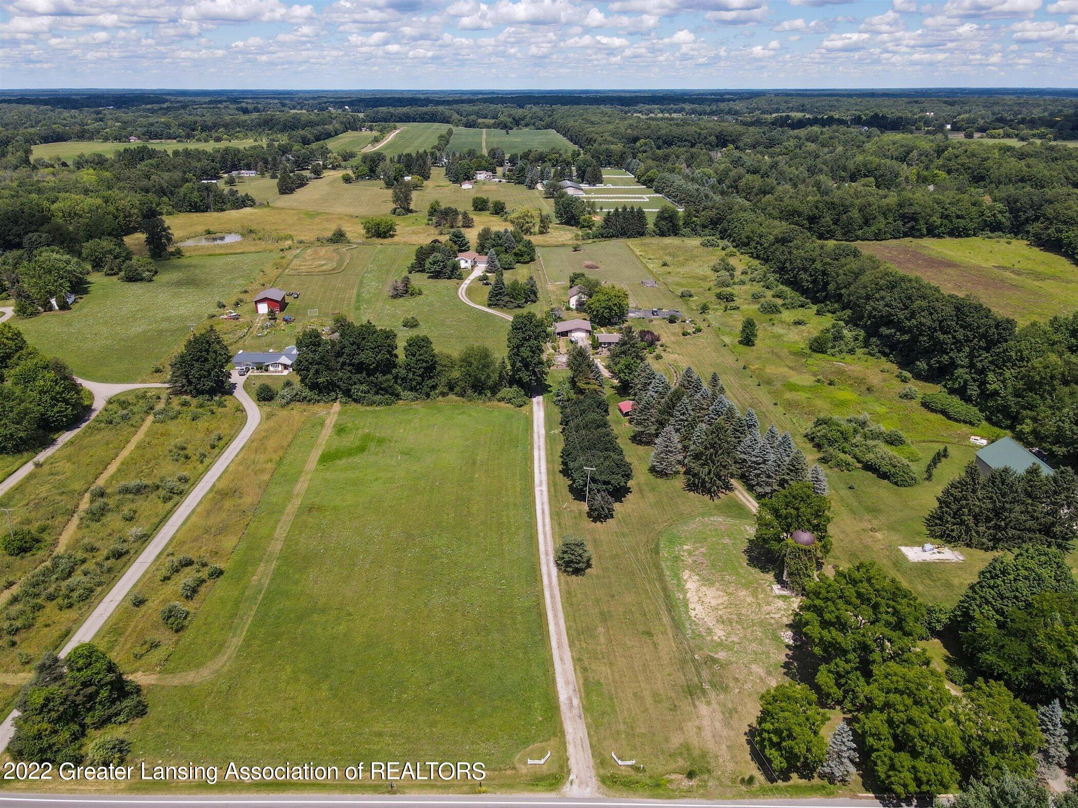 1459 Haslett Road Williamston, MI 48895 - Photo 52 of 54 52-1459-Haslett-Rd-WindowStill-Real-Esta