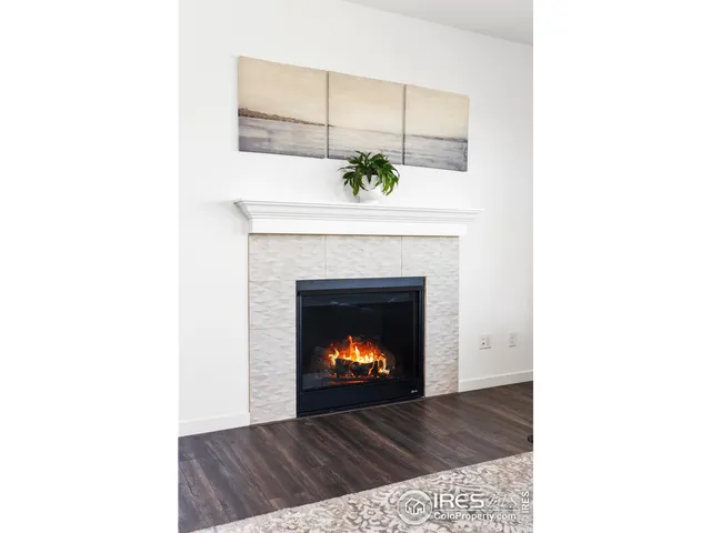 a living room with a fireplace