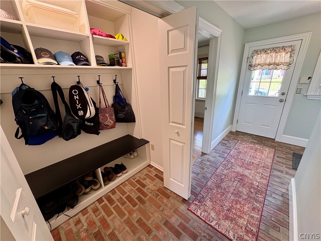 7892 East Ridge Pointe Drive Manlius, NY 13066 - Photo 21 of 46 Mudroom hallway outfitted with a convenient California Closet storage system.