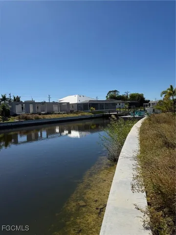 a view of a lake with houses