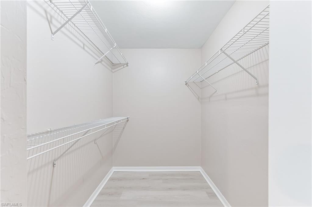 3630 10th Avenue Southeast Naples, FL 34117 - Photo 26 of 50 a view of small space with racks on the wall