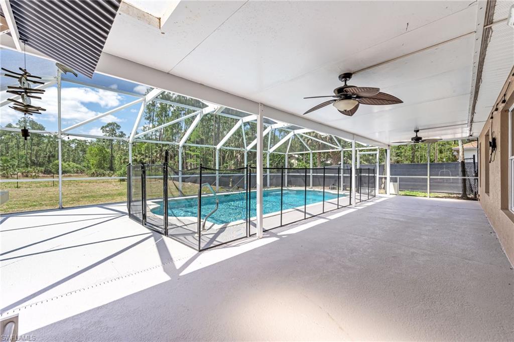 3630 10th Avenue Southeast Naples, FL 34117 - Photo 36 of 50 a view of a room with wooden ceiling