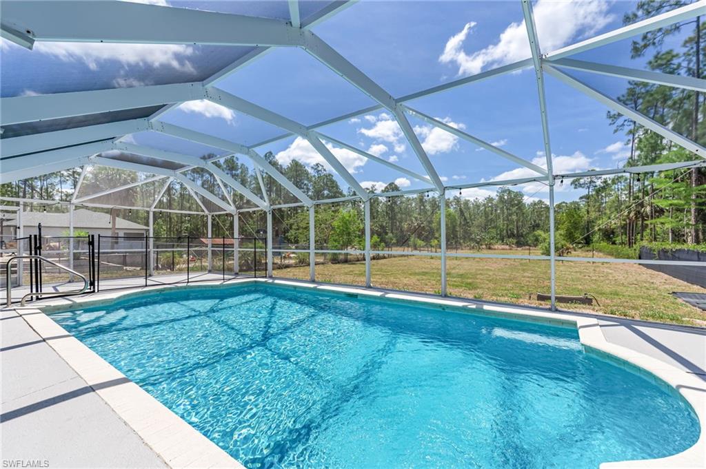 3630 10th Avenue Southeast Naples, FL 34117 - Photo 40 of 50 a view of a backyard