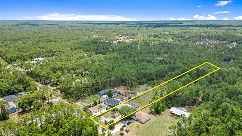 3630 10th Avenue Southeast Naples, FL 34117 - Photo 50 of 50 a view of a tennis court