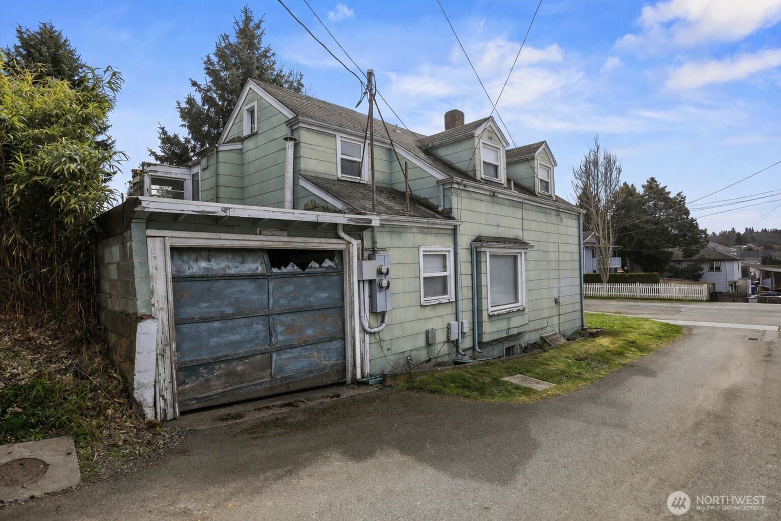 1817 34th Street Everett, WA 98201 - Photo 18 of 19 a front view of a house with a yard