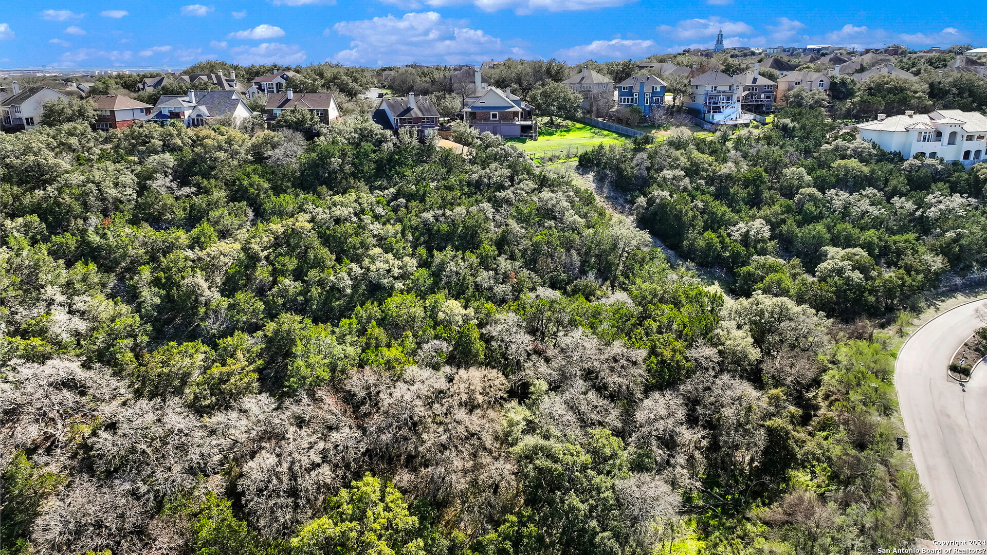 602 Winding Ravine San Antonio, TX 78258 - Photo 4 of 16 a view of a city with a mountain
