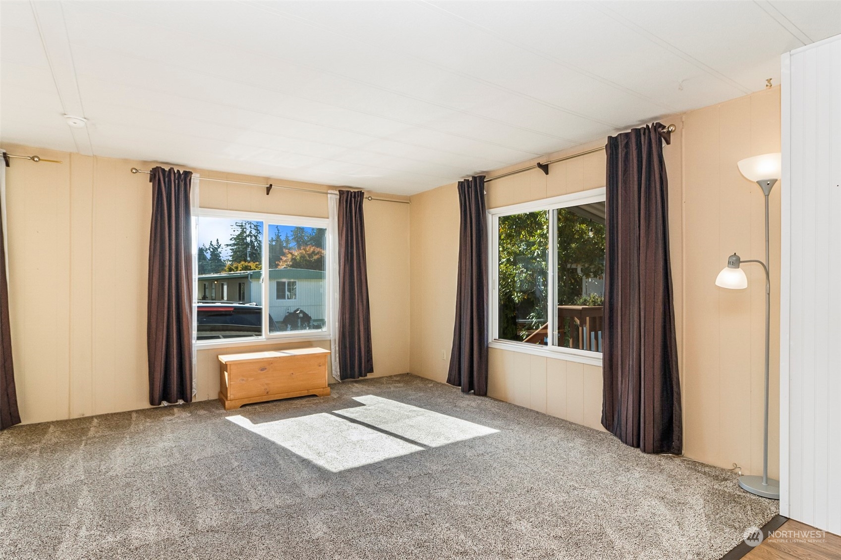 11622 Silver Lake Road, Unit 101 Everett, WA 98208 - Photo 15 of 40 a view of an empty room with a window