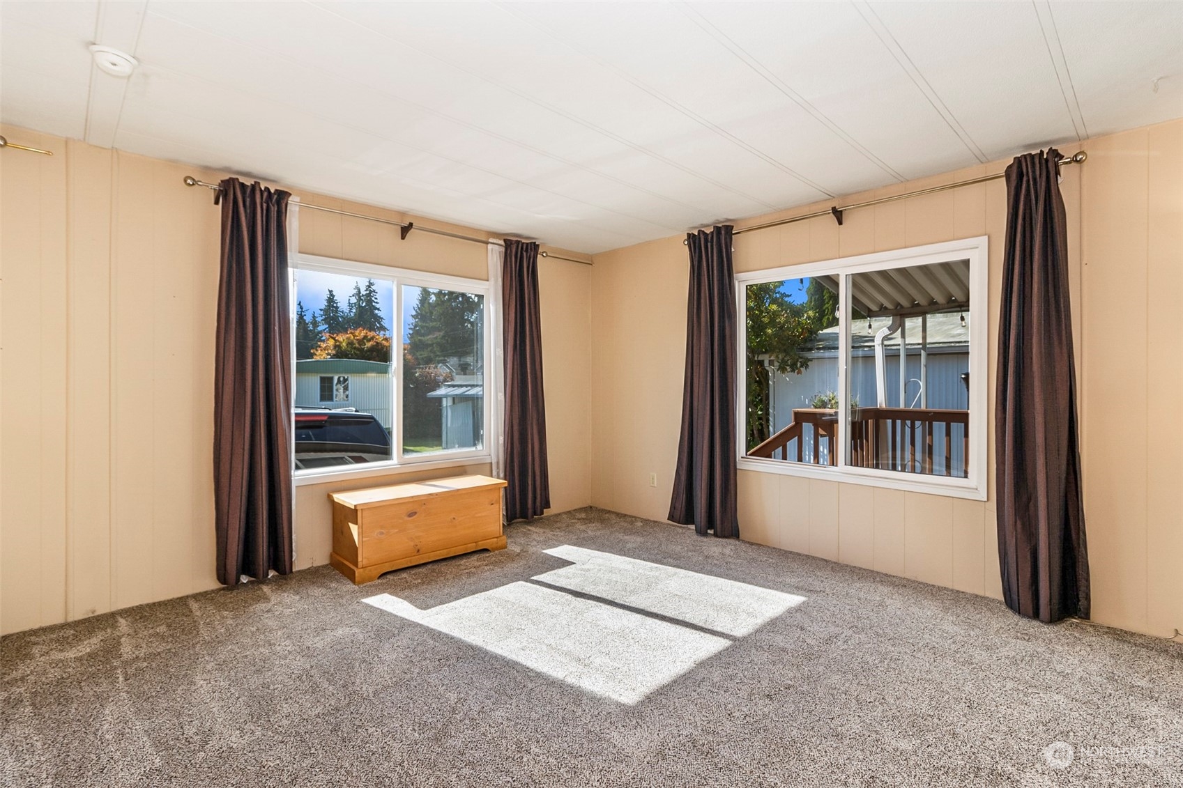 11622 Silver Lake Road, Unit 101 Everett, WA 98208 - Photo 18 of 40 a living room with furniture and large windows
