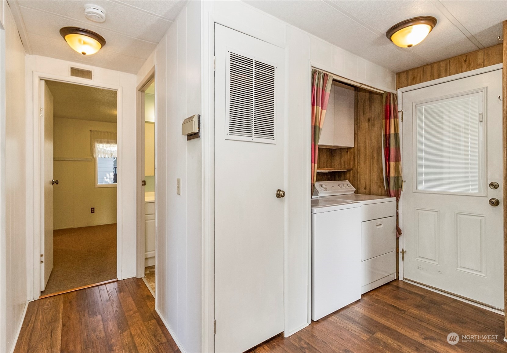 11622 Silver Lake Road, Unit 101 Everett, WA 98208 - Photo 26 of 40 a view of hallway with wooden floor