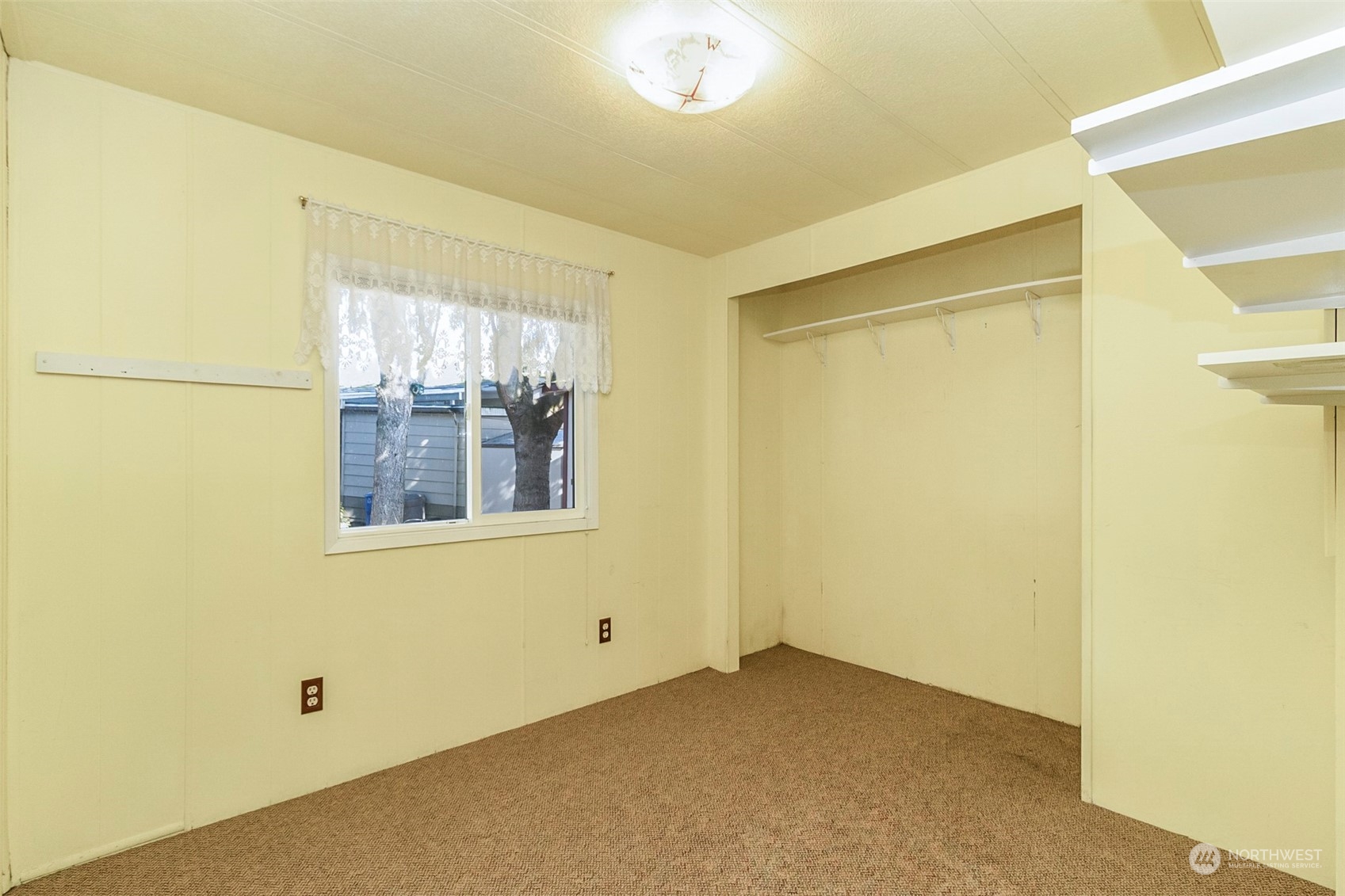 11622 Silver Lake Road, Unit 101 Everett, WA 98208 - Photo 32 of 40 a view of an empty room with a window