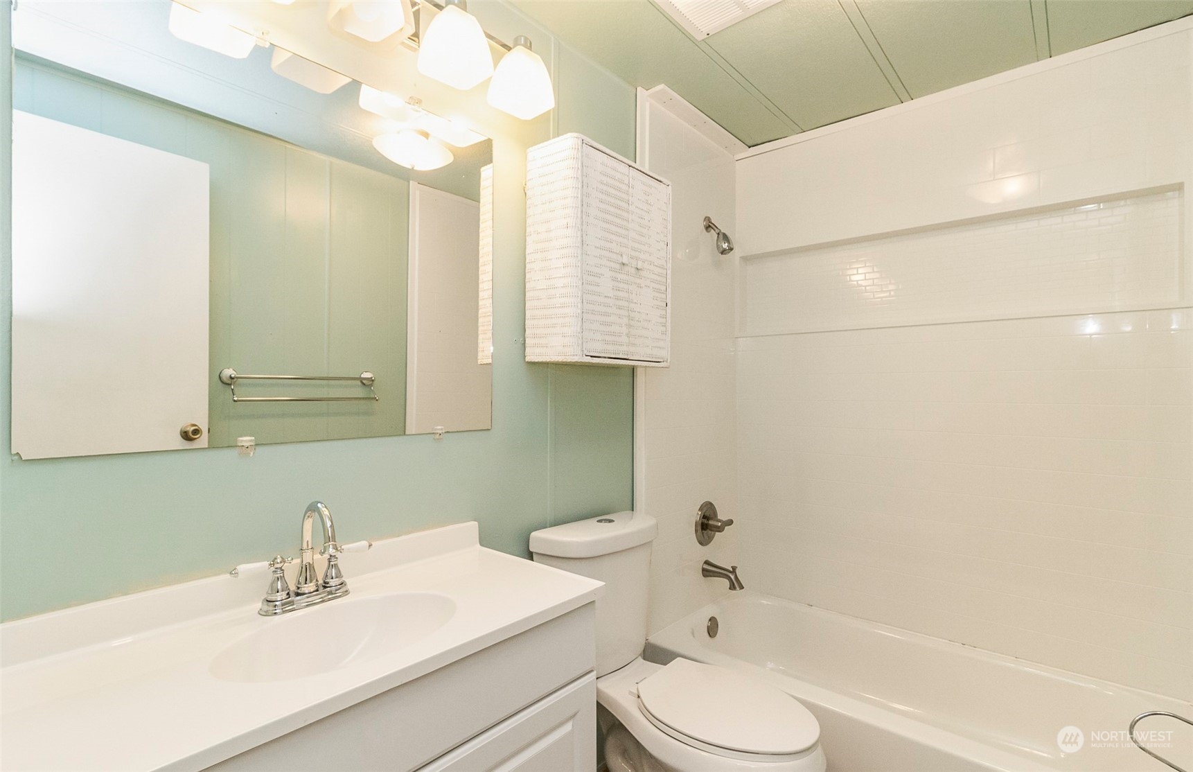 11622 Silver Lake Road, Unit 101 Everett, WA 98208 - Photo 35 of 40 a bathroom with a sink toilet and shower