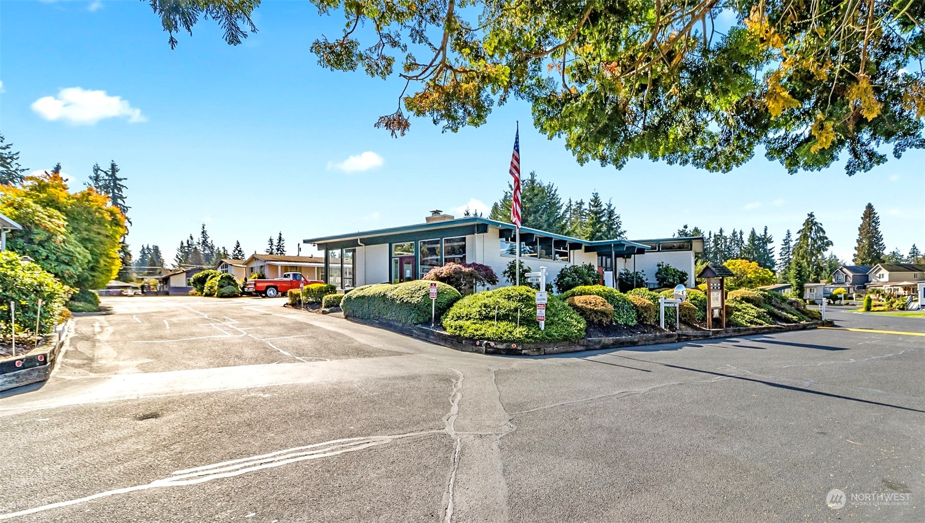 11622 Silver Lake Road, Unit 101 Everett, WA 98208 - Photo 39 of 40 a view of a street with cars parked