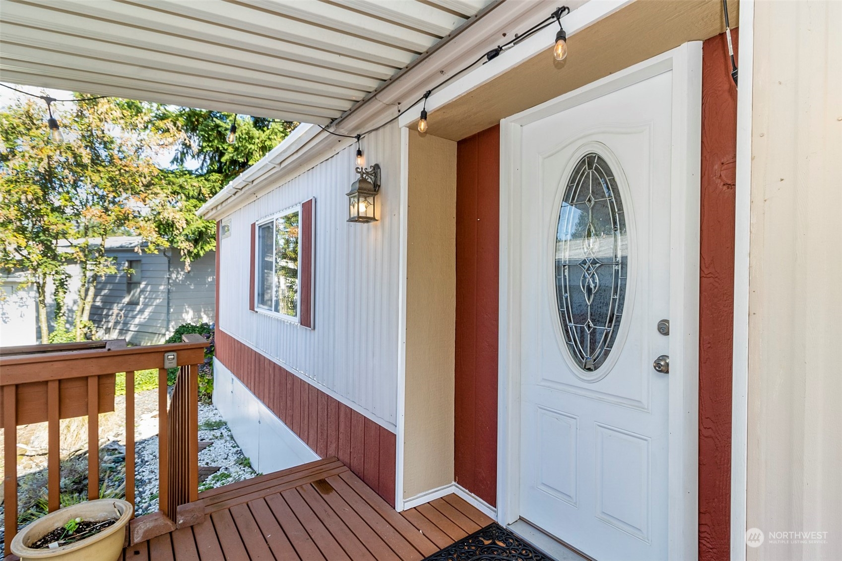 11622 Silver Lake Road, Unit 101 Everett, WA 98208 - Photo 7 of 40 a view of a house with entryway and wooden stairs