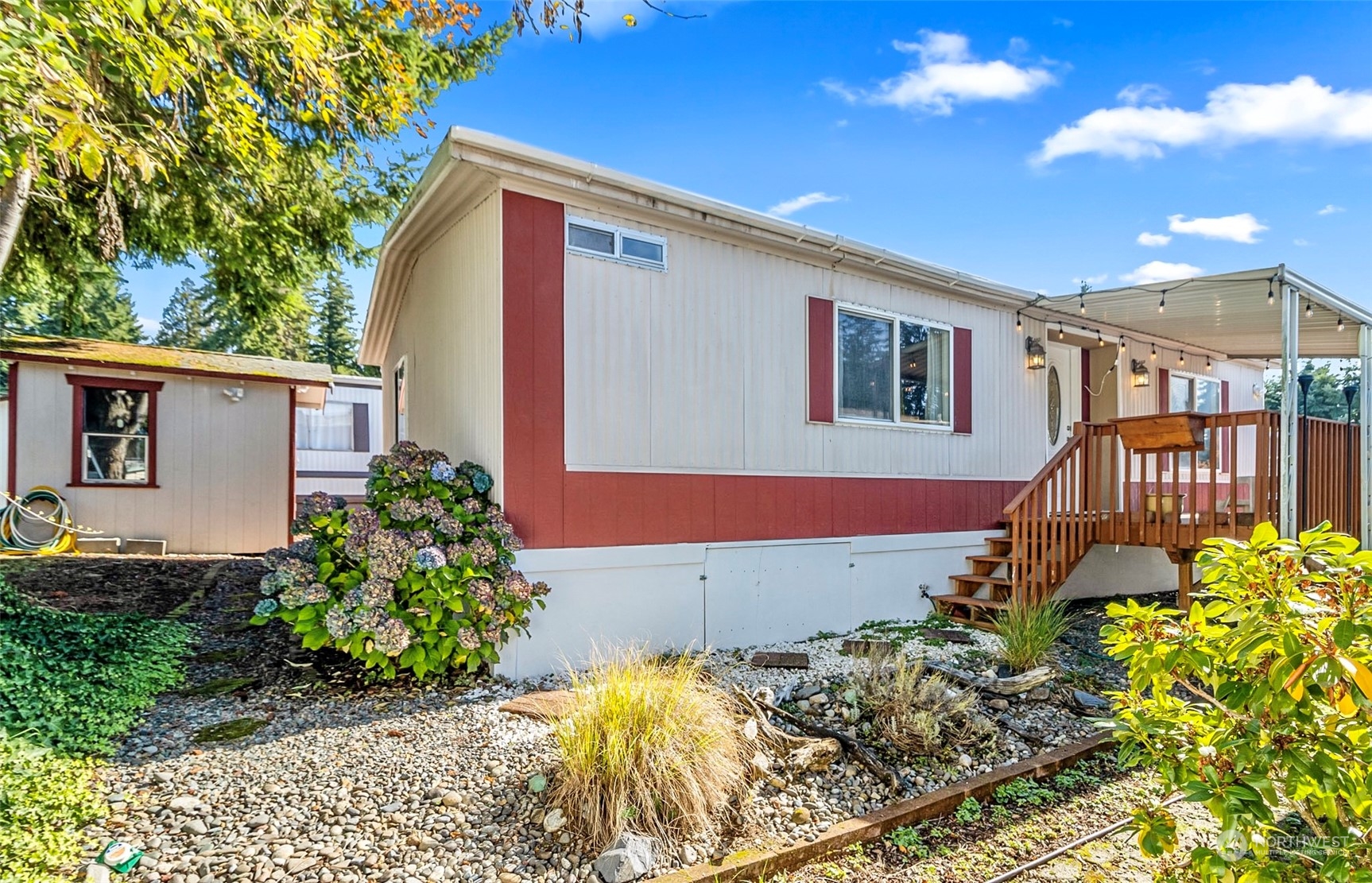 11622 Silver Lake Road, Unit 101 Everett, WA 98208 - Photo 8 of 40 a front view of a house with a yard
