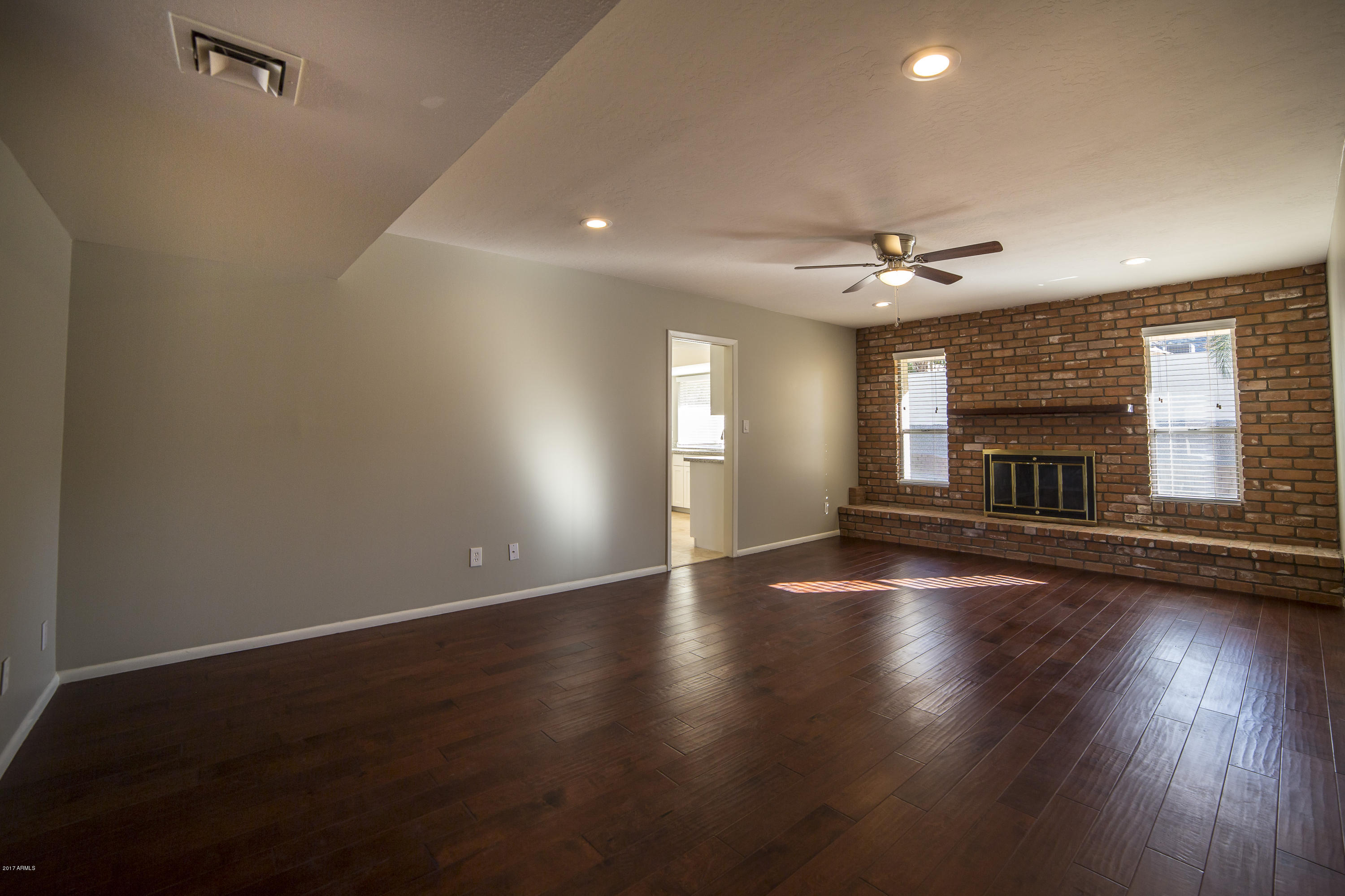 3337 East Las Rocas Drive Phoenix, AZ 85028 - Photo 8 of 27 Family Room Hardwood Floors