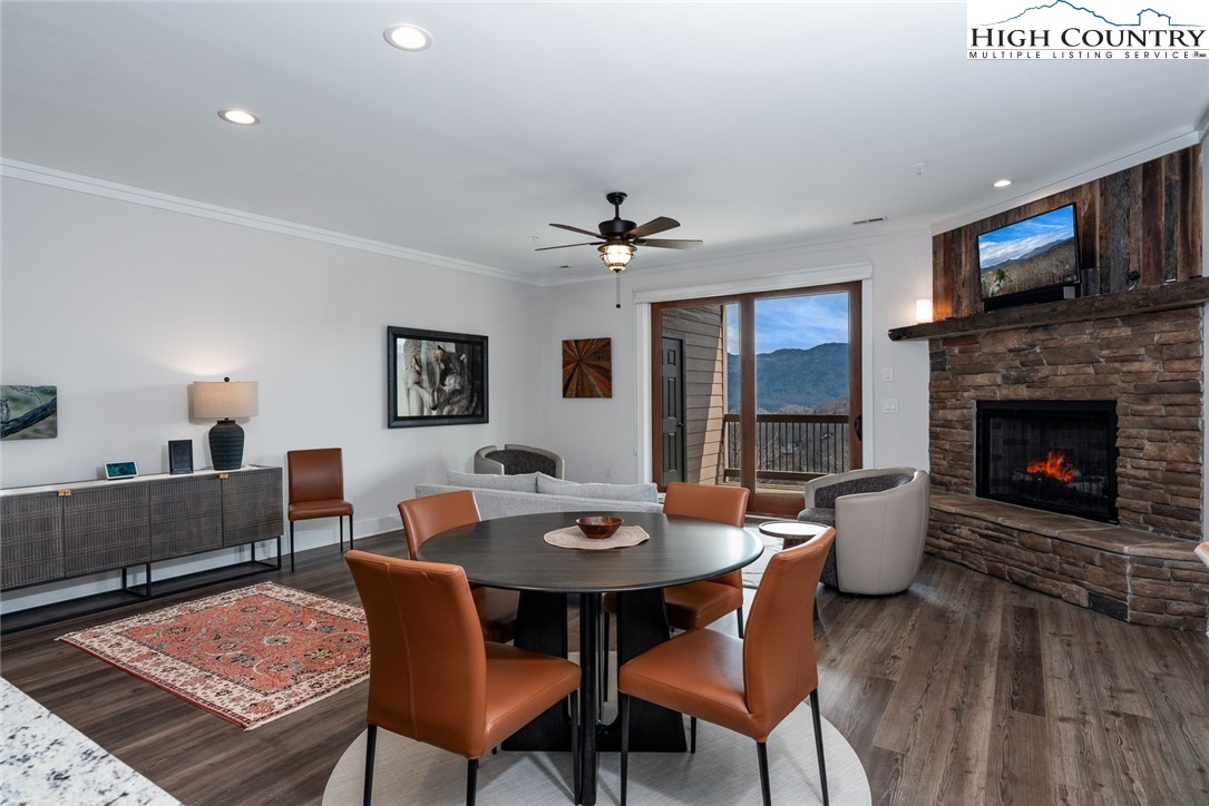 240 Ridgeline Drive, Unit D Sugar Mountain, NC 28604 - Photo 5 of 30 a view of a dining room with furniture