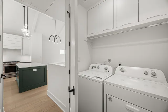 a bathroom with a sink a mirror and a window