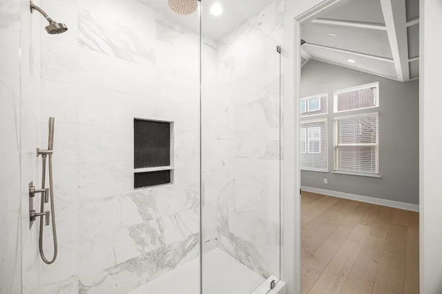 a spacious bathroom with a double vanity sink mirror and double