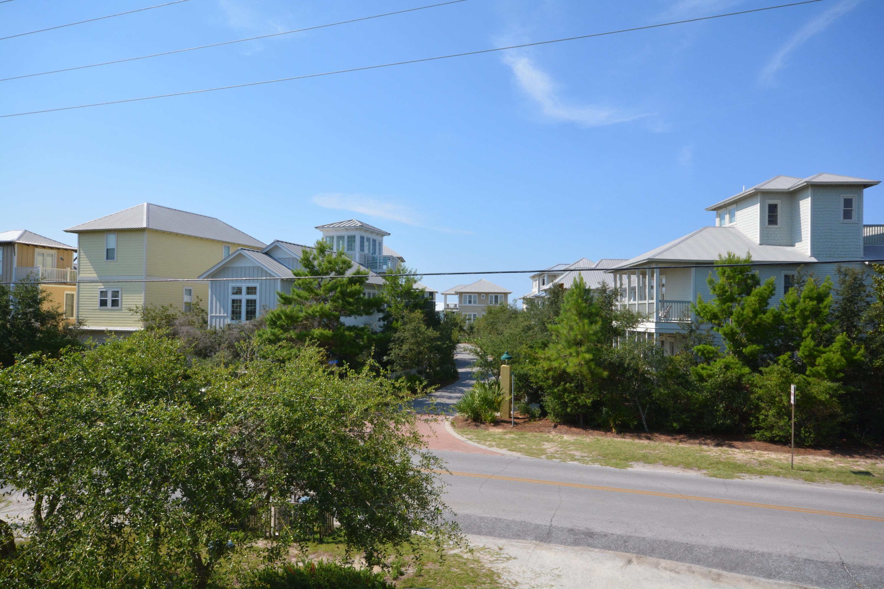 41 A Eastern Lake Road Santa Rosa Beach, FL 32459 - Photo 22 of 22 a front view of a house with a yard and trees