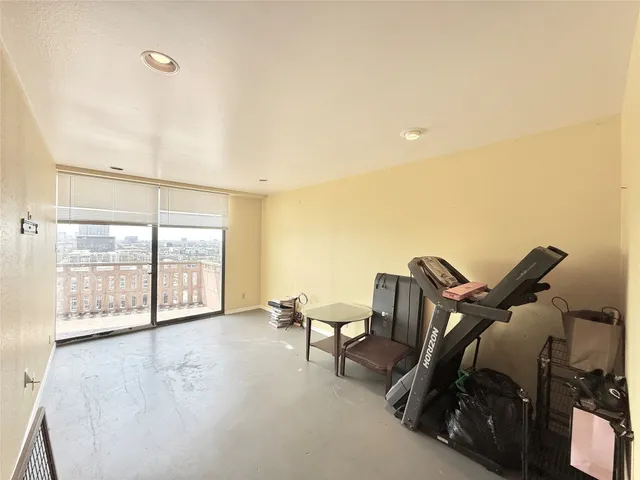 a view of workspace with furniture and windows