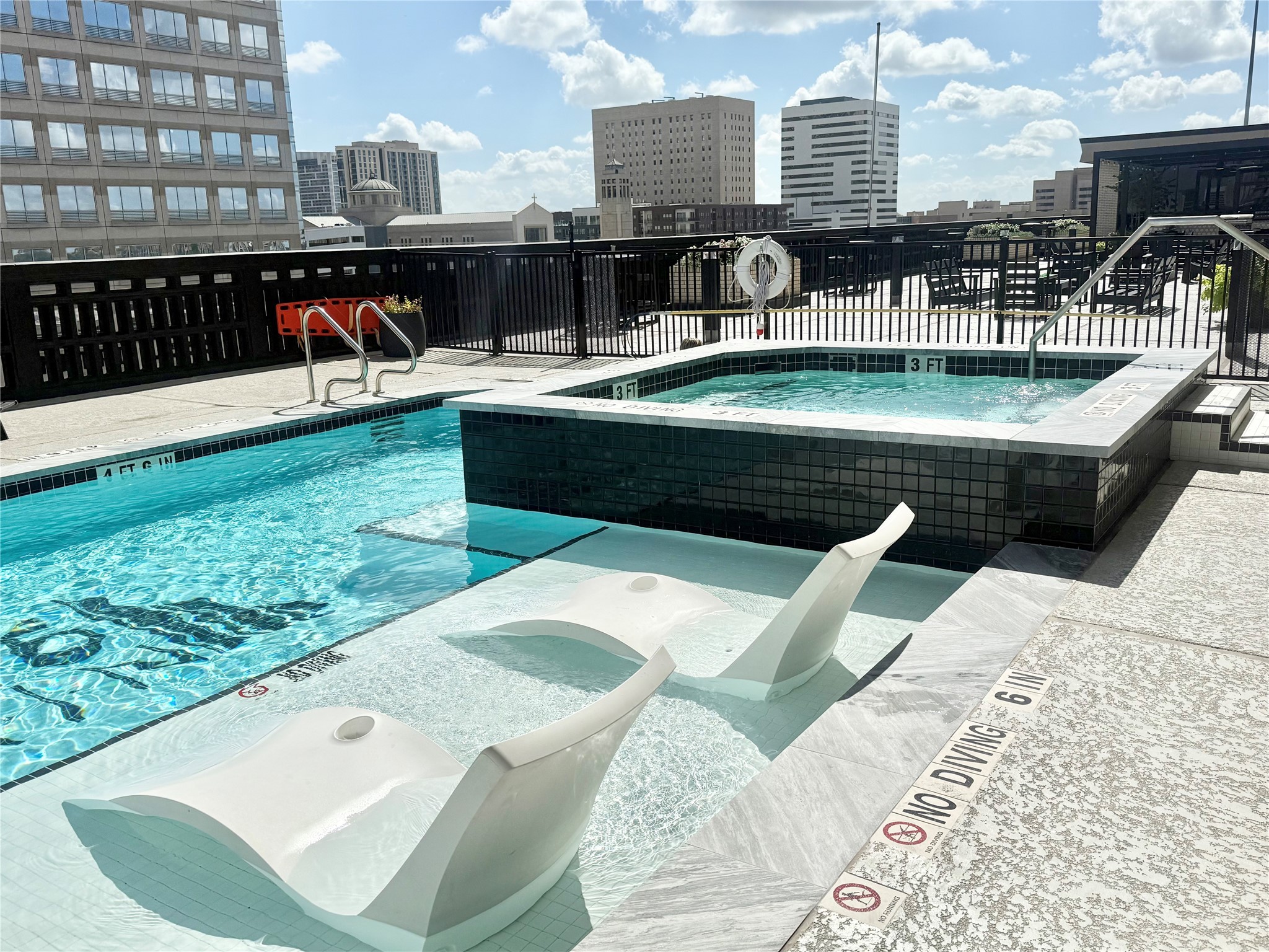 2016 Main Street, Unit 1704 Houston, TX 77002 - Photo 29 of 38 a view of swimming pool with outdoor seating