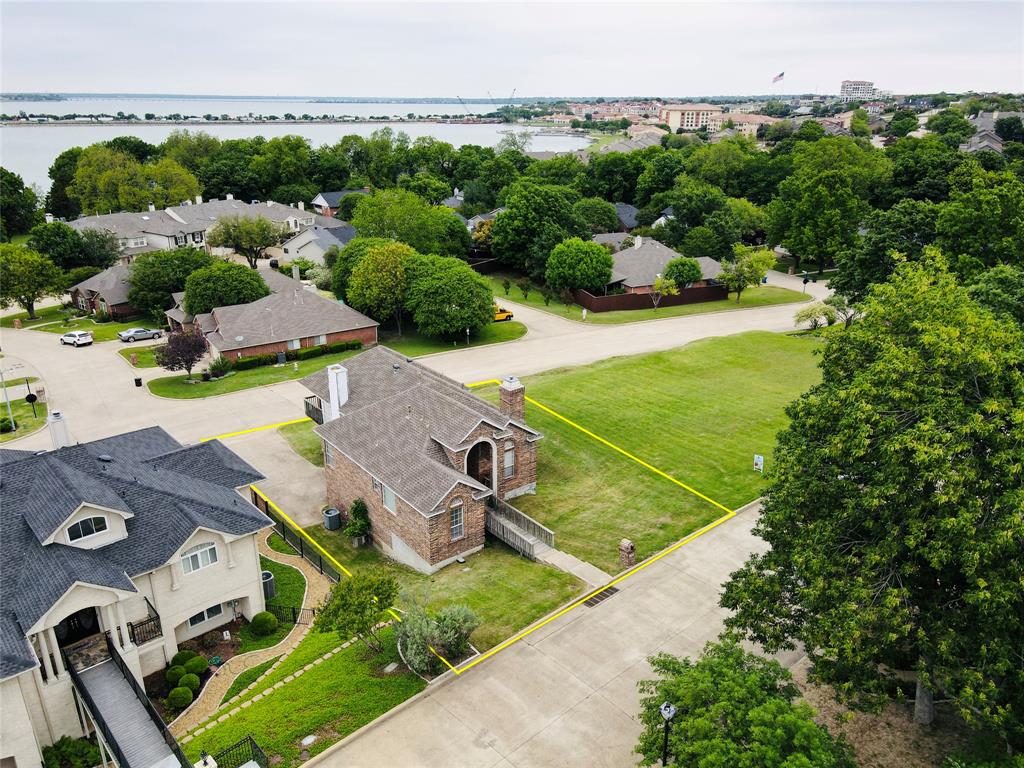 an aerial view of a house with a garden