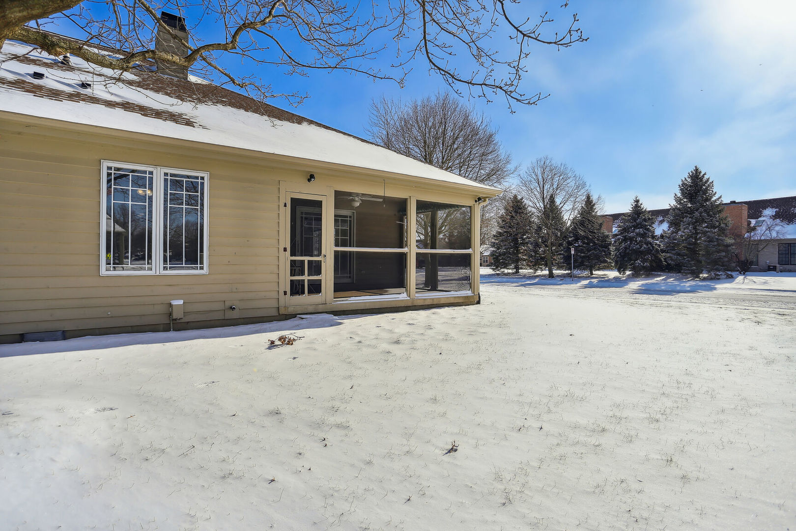 1731 Lakeside Drive, Unit B Champaign, IL 61821 - Photo 17 of 21 a view of house with a yard
