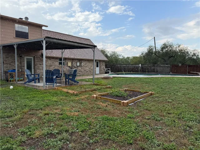 an outdoor space with garden view