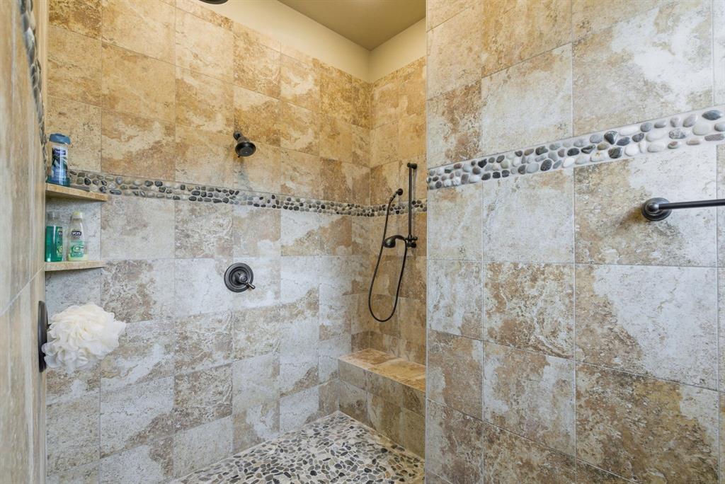 735 Gresham Lane Jacksboro, TX 76458 - Photo 16 of 40 a bathroom with a shower